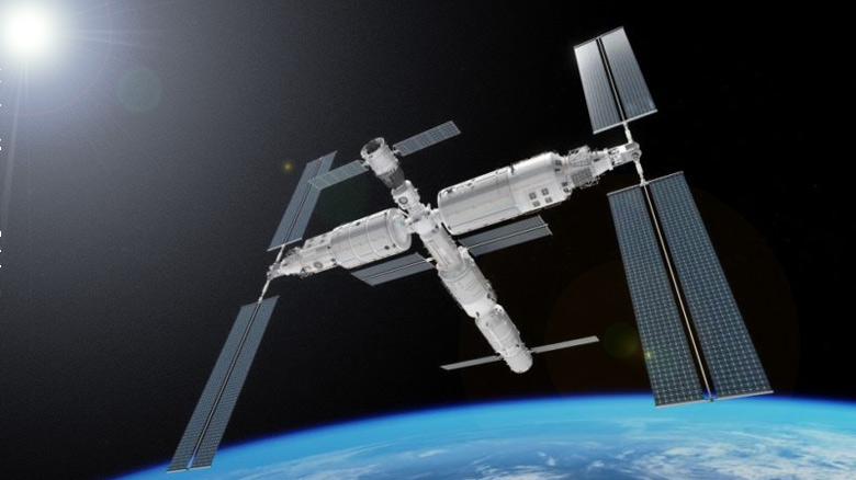 Concepção artística mostra como será a nova estação espacial chinesa. O módulo Tianhe pode ser visto no centro da estrutura.