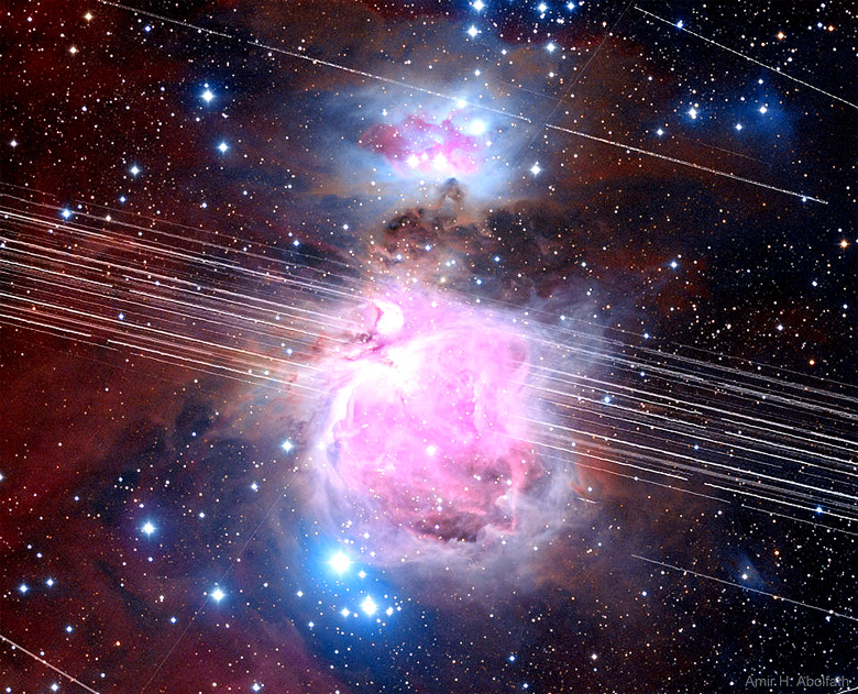 Nebulosa M42 traçada por inúmeras passagens de satélites artificiais. - Crédito: Amir H. Abolfath.