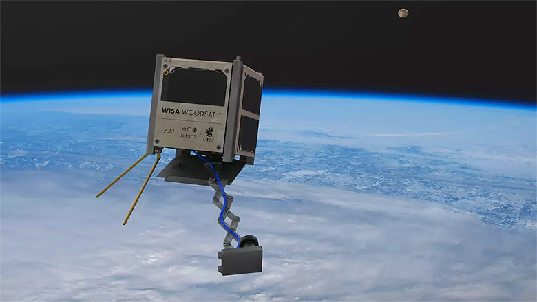 Concepção artística mostra o satélite WoodSat em operação em orbita da Terra.
